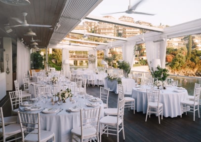 Outdoor misting system cooling an event space